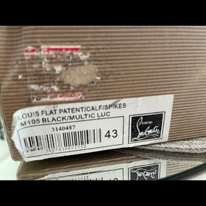 ( )Christian Louboutin sneakers